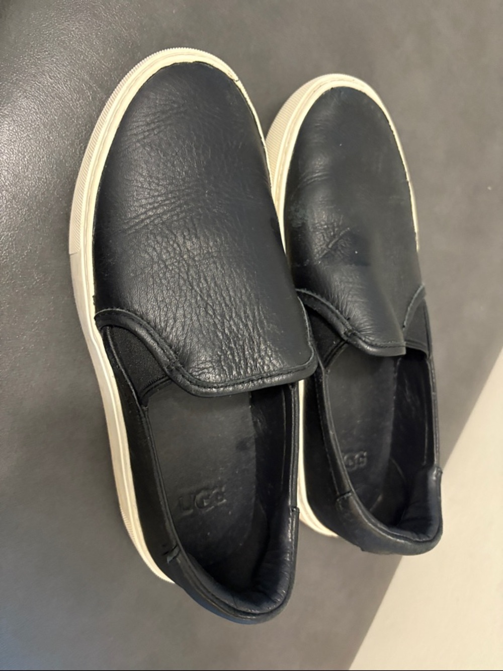 UGG Black Leather Slip-On Sneakers with Cream Soles